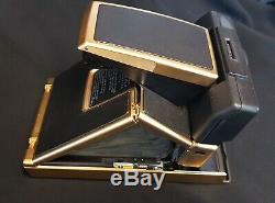 Polaroid SX-70 Sonar model, gold version (very rare) boxed new fully working