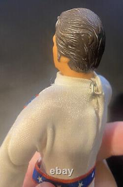 1ère édition de la figurine Evel Knievel (mèches grises) avec casque de bélier! Très rare des années 70