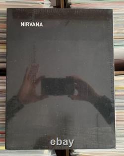Coffret de livres Nirvana. Photographies signées en édition limitée, scellées, très rares.