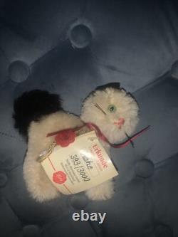 Hermann porte un chat en édition limitée ? Très rare, très beau.